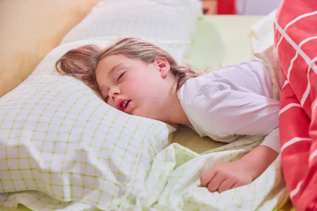 What causes snoring in children?
